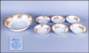 Noritake Fruit Set comprising one serving bowls and bowl and 6 smaller dishes. Gilt decoration on