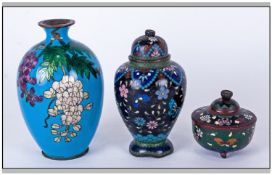 Three Pieces of Cloisonne comprising ovoid blue vase with floral decoration, cover vase and