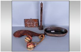 Four Ethnic Carved Wood Items. Comprising carved bowl decorated with fish, shaped club, totem,