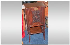 Oak Magazine Cupboard with Fall Down Front to Reveal Three Storage Sections And a Shelf Below.