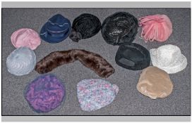 collection of vintage ladies hats some looking to from the 1960's  
a variety of styles and