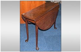 Small Size George III Walnut Drop Leaf Supper Table, on Queen Ann style legs with pad feet. Circa