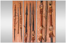 African Tribal Art. Comprising three spears. All with wooden handles and steel heads to clad and