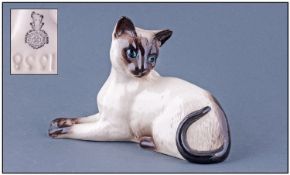 Royal Doulton Cat Figure ``Siamese Cat Lying`` Style 2. Model number 1558. Issued 1990-99.