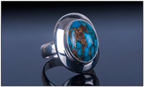 Arizona Copper Turquoise Ring, an oval cabochon of of 5.3cts of Mojave turquoise set in a hand