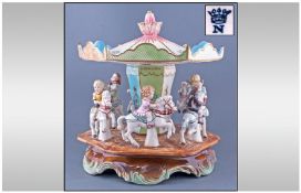 Capodimonte Early 1950`s And Rare Porcelain Fairground Carousel. With children seated on white