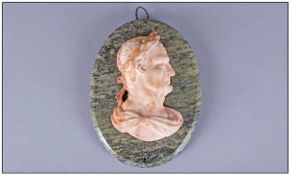 19th Century Small Marble Plaque, depicting Ceasar. Mounted on a green oval marble slab. 7 x 5