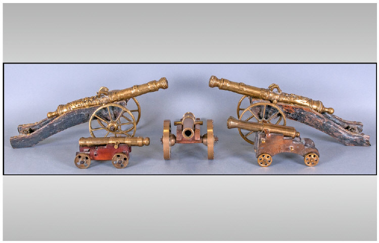 Five Brass Canons On Wood Carriages, one pair with cast barrels with Dutch crest on a brass mounted