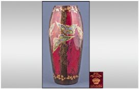 Devon Sylan Lustrine Vase, butterflies on ruby red ground. Circa 1930`s. Stands 9 inches high.