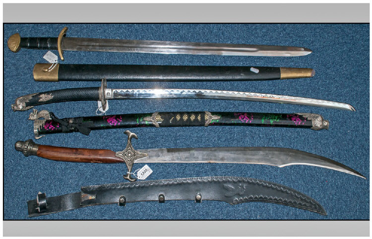 Display Purposes Only. Collection Of three fantasy/gladius swords. All three with scabbards.