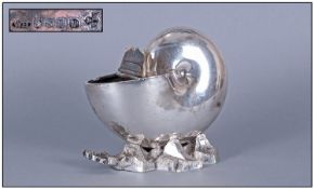 Antique Nautilus Hard Metal Spoon Warmer, with lift up lid on a rooky shell base. Made by Walker &