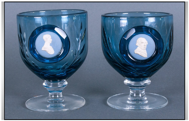 Pair Of Fine Quality Wedgwood Blue Cut Glass Goblets, surmounted to the front with blue jasperware