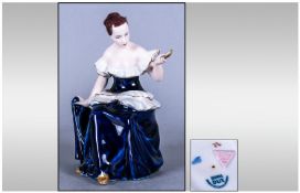 Royal Dux Cobalt Blue And White Porcelain Figure. Circa 1930`s. Lady with hand mirror. Height 6