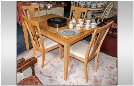Modern Bleached Beech/Elm Dining Table and 4 upholstered Chairs with inlayed geometric pattern.