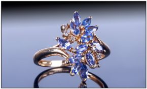 Ladies 9ct Gold Tanzanite Ring, Set with round cut diamonds and marquise cut tanzanites. Fully