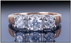 Ladies 14ct Gold Diamond Ring, Set with three round modern brilliant cut diamonds. Stamped 14K.