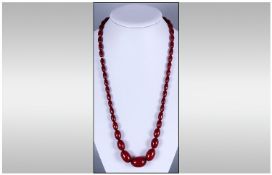 A Fine Quality Vintage Amber Bead Necklace Of Graduating Form, 44.5 grams, length 26 inches.