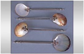 Set Of Four Victorian Gothic Style Mother Of Pearl Decorative Spoons, with silvered metal handles.