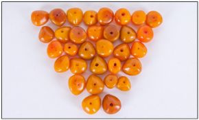 A Collection Of 34 Free Form Beads, Amber Butterscotch coloured, all drilled with holes ready for