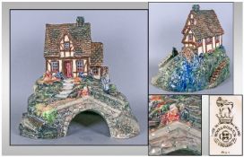 Royal Doulton Rare Perfume Burner In The Form Of A House And Bridge. The figures looking down