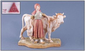 Royal Dux Late 19th Century Figure. Circa 1900. Milk maid and cow. Pink triangle to base. Height 8