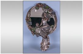 Modern Decorative Wall Hanging Circular Mirror with figural decoration. Bronzed finish and