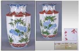 A Large And Impressive Japanese Antique Porcelain Vase Of Cylinder Shape, decorated in underglazed