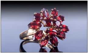 Ladies 9ct Gold Cluster Ring, Set with round and marquise garnet coloured stones. Fully hallmarked.