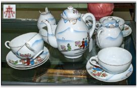 Japanese Tea Set Comprising 6 Cups, 5 Saucers, Milk jug, sugar bowl & tea pot. (14 in total)