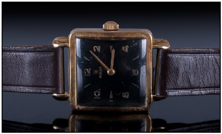 Gents 9ct Gold Rolex Wristwatch, Reference 1164. Square black dial with gilt Arabic and baton