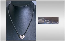 Georg Jensen Modern Jewellery. Black hematite bead necklace with integral silver heart shaped