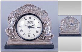 Modern Silver Cased Mantel Clock, raised decoration depicting four horses and floral motifs. Fully