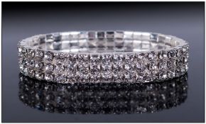 Swarovski White Crystals Three Row Bracelet, brilliant round cut crystals in claw settings,