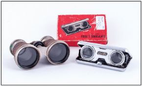 Le Jockey Club Paris Binoculars. Together with pocket binoculars in box.