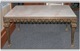 Marble Topped Oblong Shaped Coffee Table, on gilded brass frame in the French style, on four