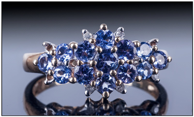 9ct Gold Tanzanite And Diamond Cluster Ring, Marquise shaped setting with round cut tanzanites and