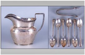 A 19th Century Helmet Shaped Silver Milk Jug Of Plain Form. Hallmark rubbed. Height 3.5 inches.