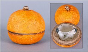 Japanese Pottery Orange. When the lid lifted it reveals an amorous Japanese couple. Late 19th