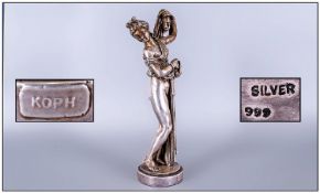 A Silver Figure Of A Semi-Clad Classical Naked Lady, raised on a circular plinth. Marked 999