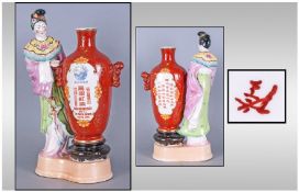 Unusual Chinese Pottery Advertising Figure, depicting a lady next to a wine jar ``The Swatow