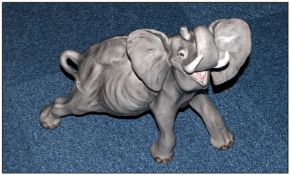 Large Ceramic Figure Of An Elephant. 14`` in height.