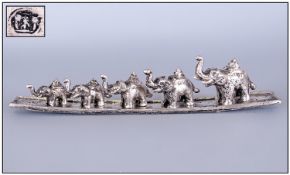 White Metal Boat Tray With A Set Of 5 Graduating Elephants.