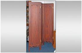 A Four Panel Carved Mahogany Oriental Four Fold Screen. 74 inches high.