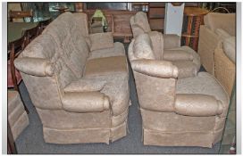 Three Piece Suite, of traditional style. Comprising a three seater and two arm chairs (one a