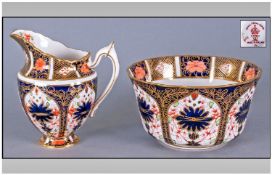 Royal Crown Derby Imari Pattern Milk Jug And Sugar Bowl. Date 1911 and 1926. Jug 5 inches high.