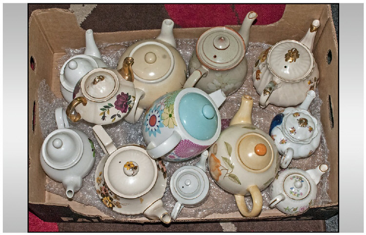 Collection of 12 Assorted Ceramic Teapots. Various Sizes and Height