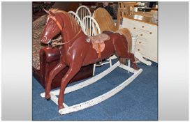 Early Twentieth Century Large Rocking Horse, painted brown with later rockers painted white.