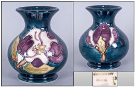 Moorcroft Small Globular Shaped Vase, white orchid on blue ground. Height 3.75 inches, good