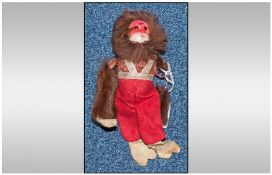 Schuco Germany Clockwork Toy, in the form of a monkey with felt and fur clothing. Working order but