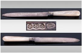 Cased Silver Bread Knife, in a leather presentation case. The blade with a serrated cutting edge,